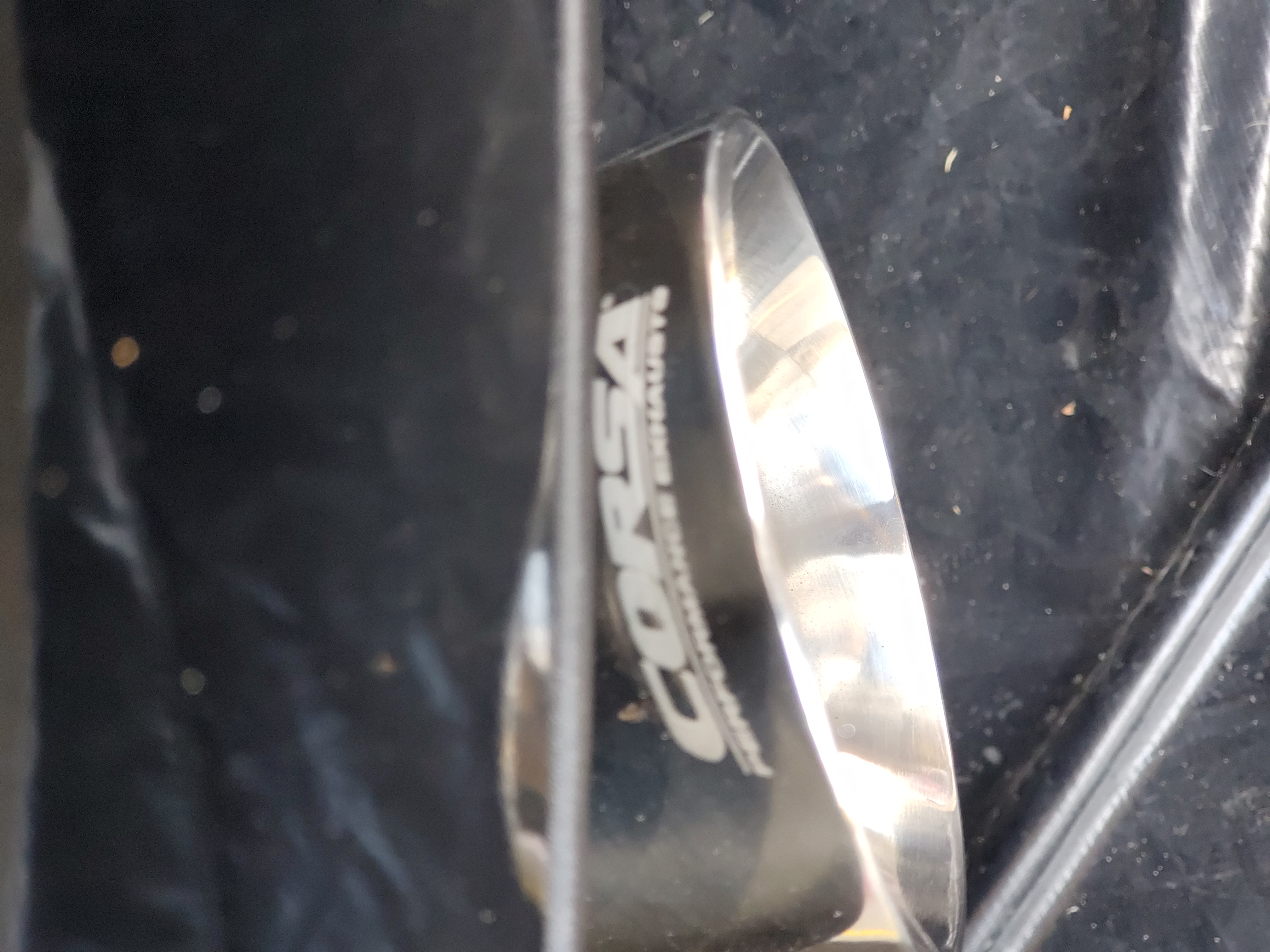 Corsa Performance branding etched into the polished tip