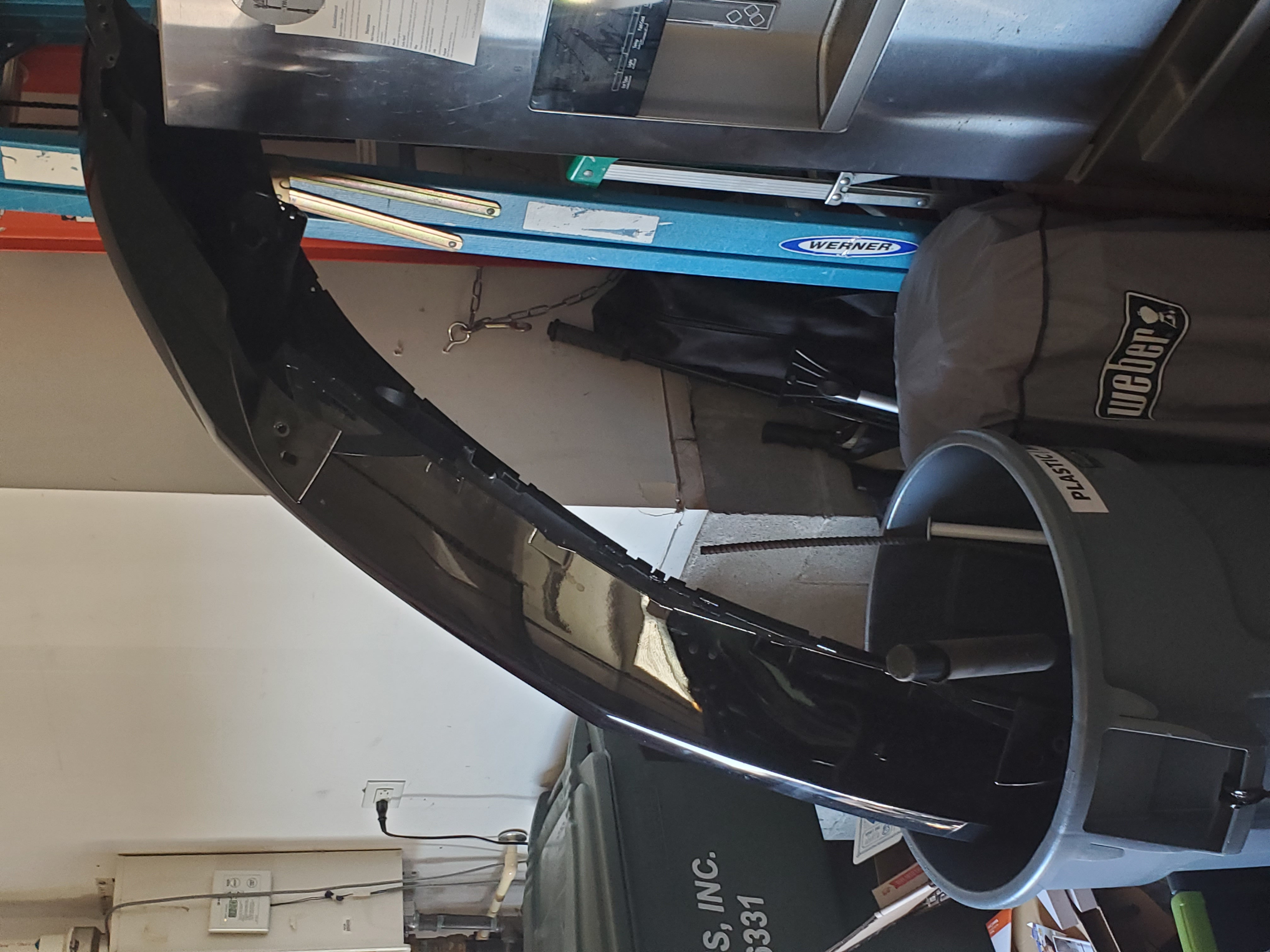 The old damaged bumper after removal